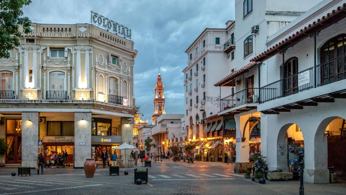 Colonial buildings and the cathedral tower at dusk in Salta's city center